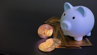 Piggy bank with coins and paper money.
