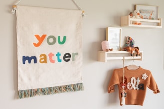 A child's room with "you matter" decor.