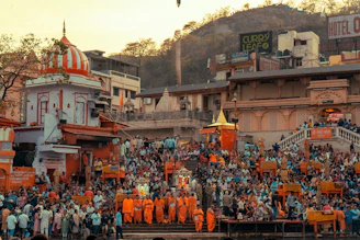 Pilgrims gather at a hindu temple complex.