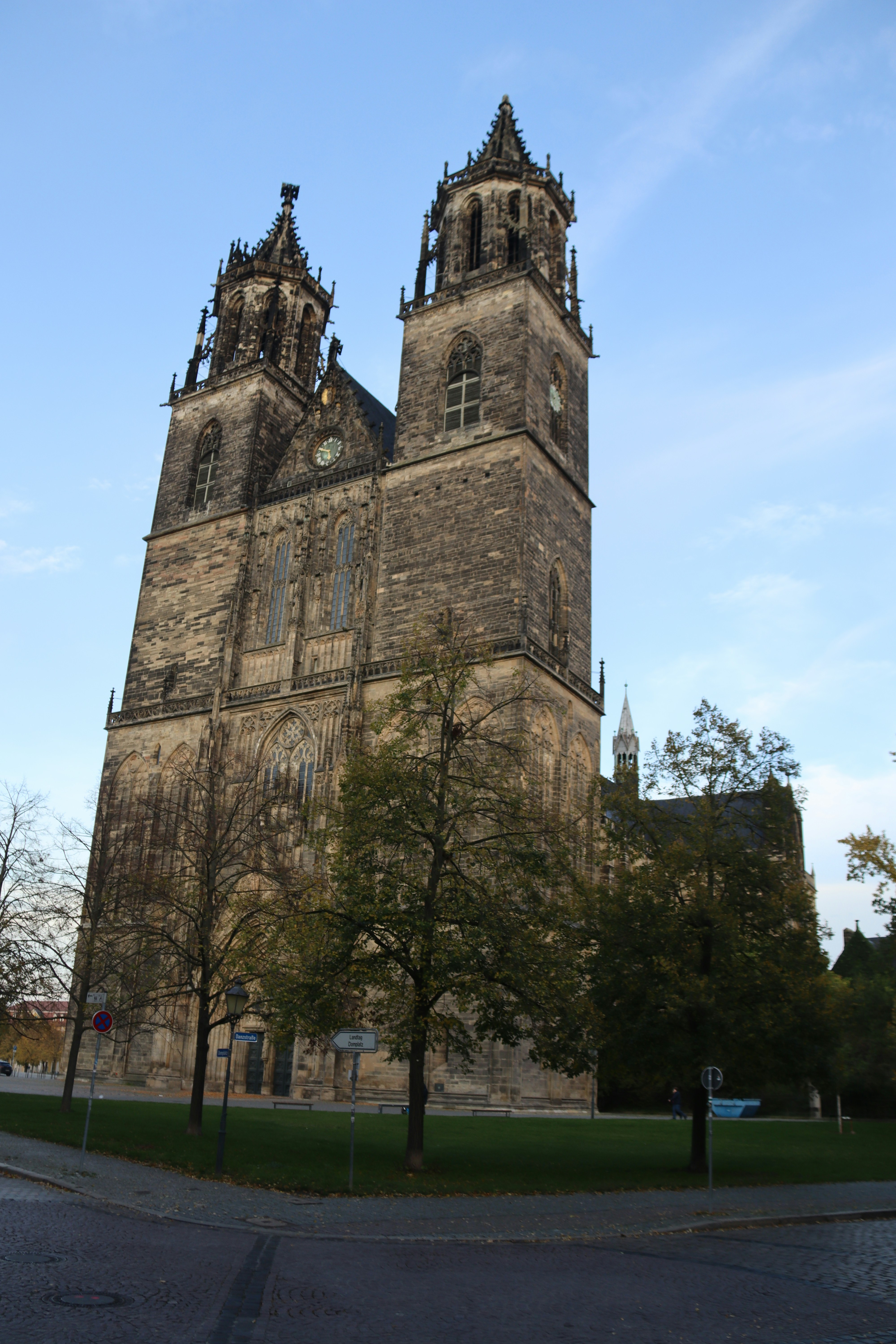 A tall church with two towers stands prominently.