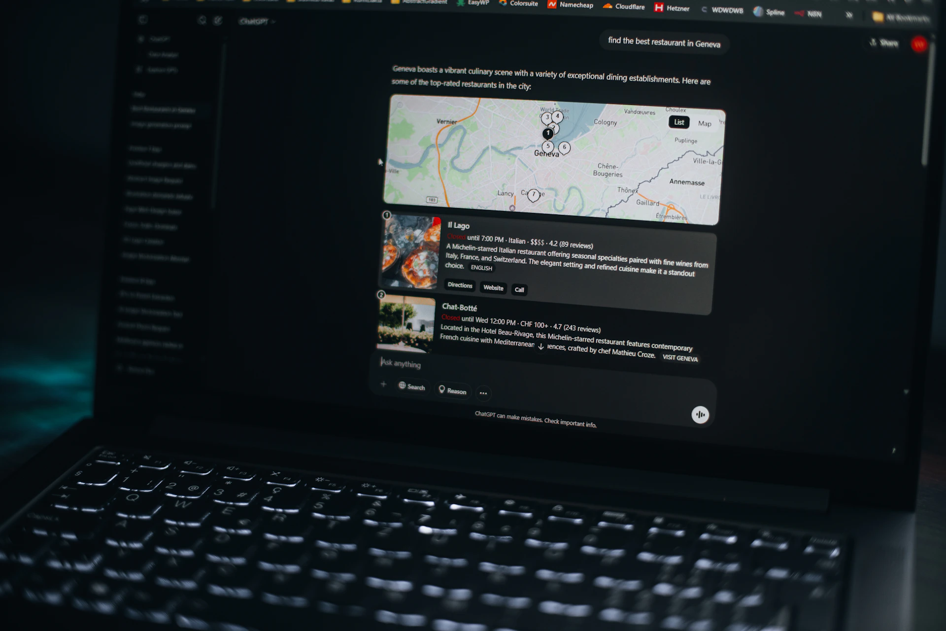 Laptop screen shows a map and related information.