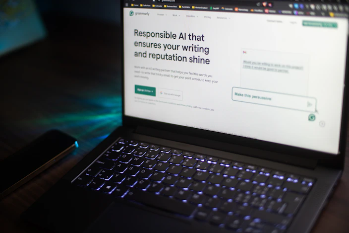 Laptop displays a website about responsible ai writing.