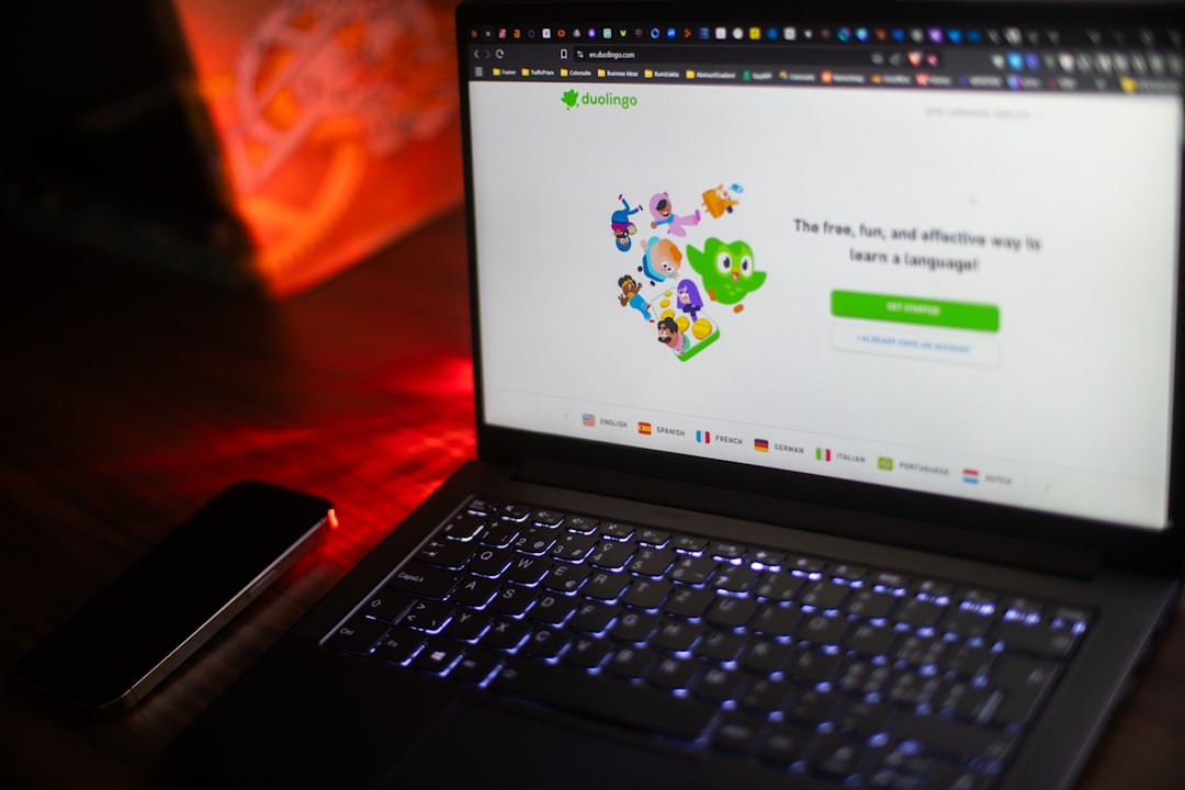 A laptop displays the duolingo homepage., Duolingo Dashboard
