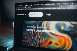 A laptop displays a website promoting creativity.