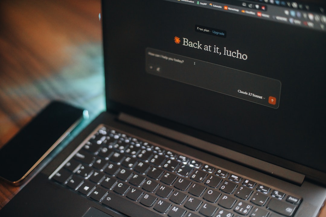 Laptop screen says "back at it, lucho"., Claude AI