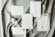 Wedding stationery arranged beautifully with ribbons.