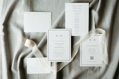Wedding stationery arranged beautifully with ribbons.