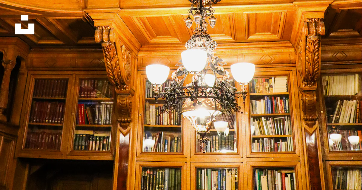 A beautiful, wooden library with ornate details. photo – Free Image on ...