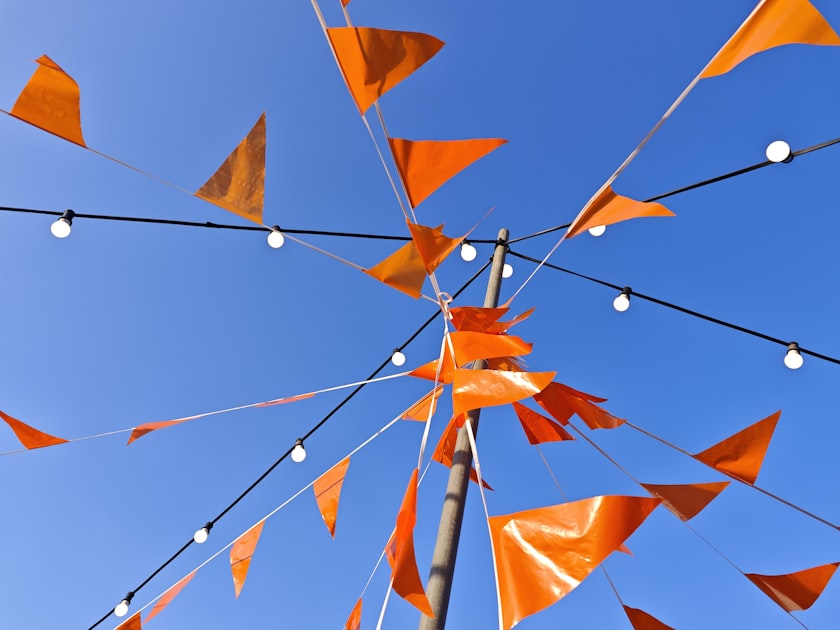 Amsterdam canals on Kings Day with orange celebrations