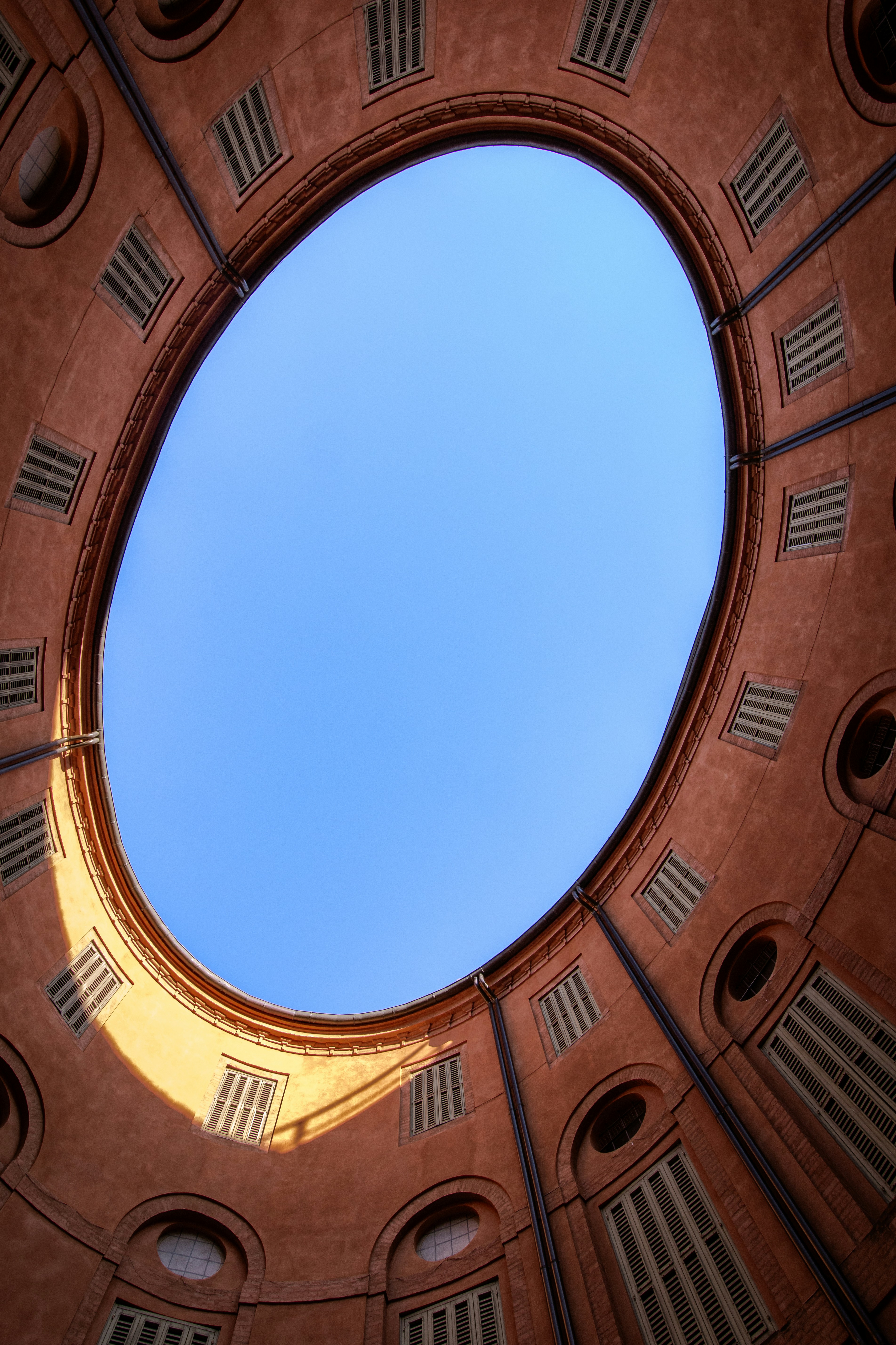 Looking up into the sky through an opening.