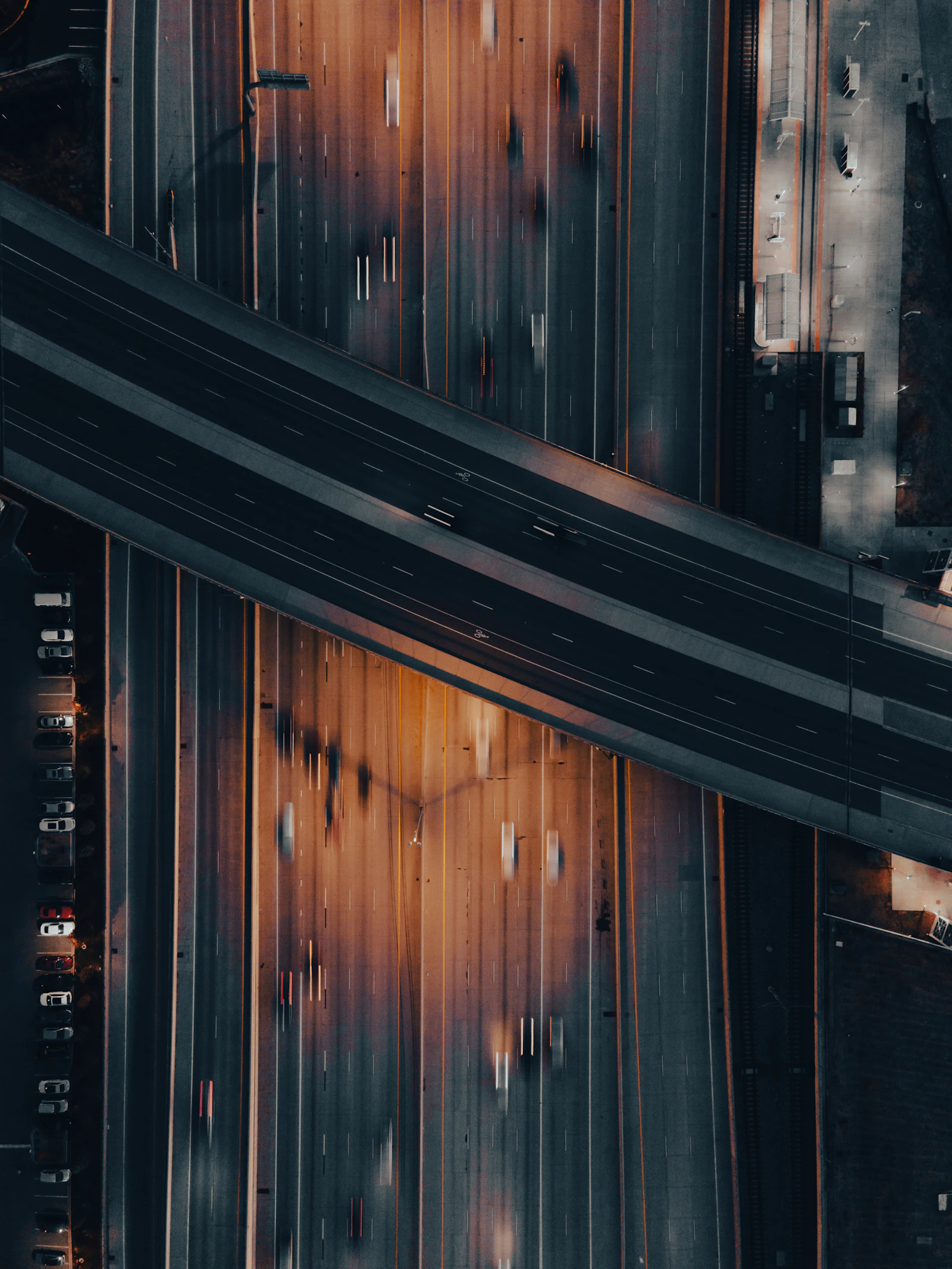 Aerial view of busy multi-lane highway traffic in motion