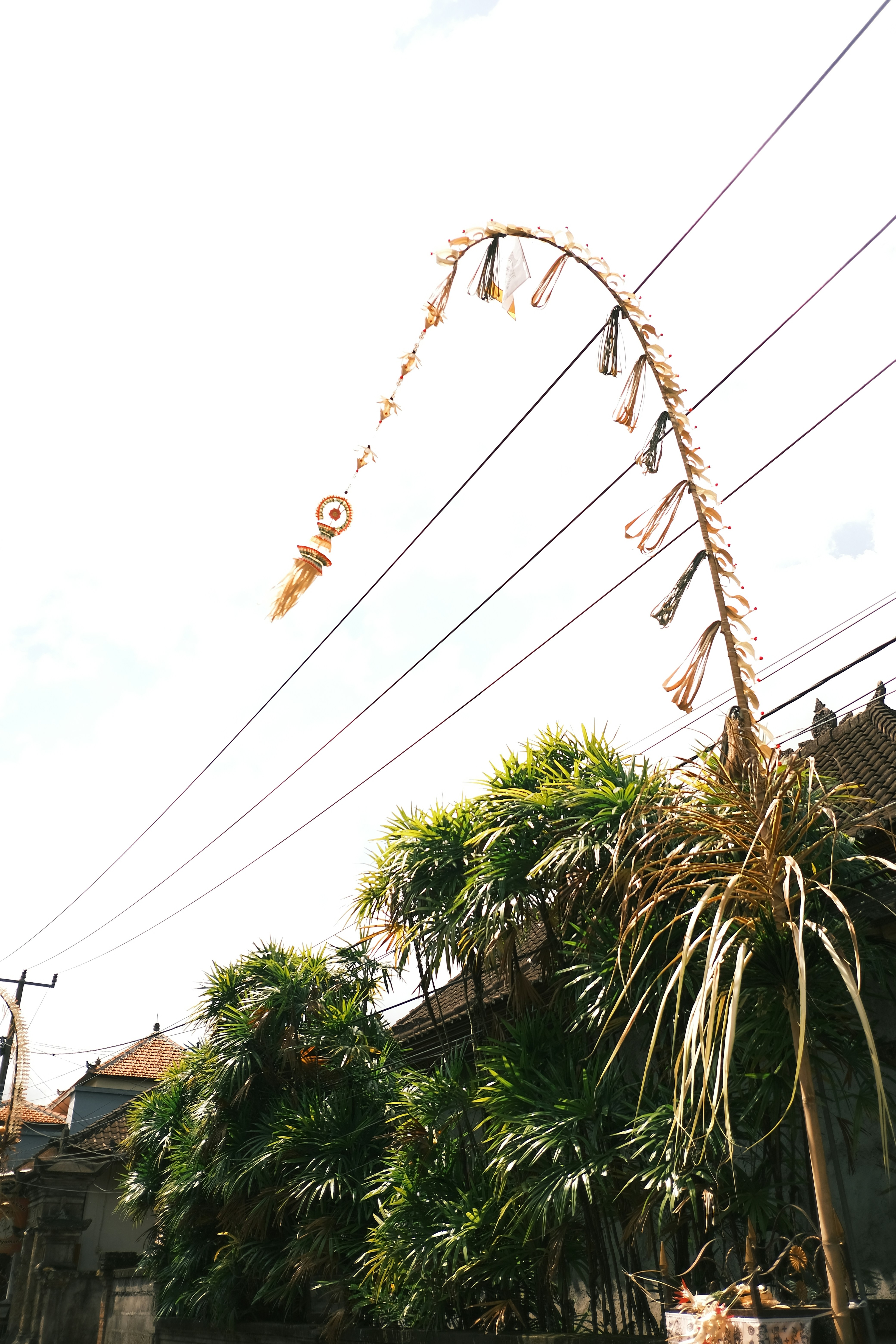 A decorative pole reaches toward the sky.