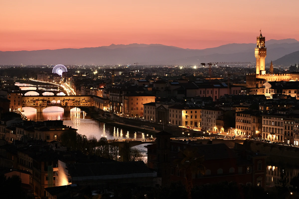 Florence skyline at sunset over the Arno River