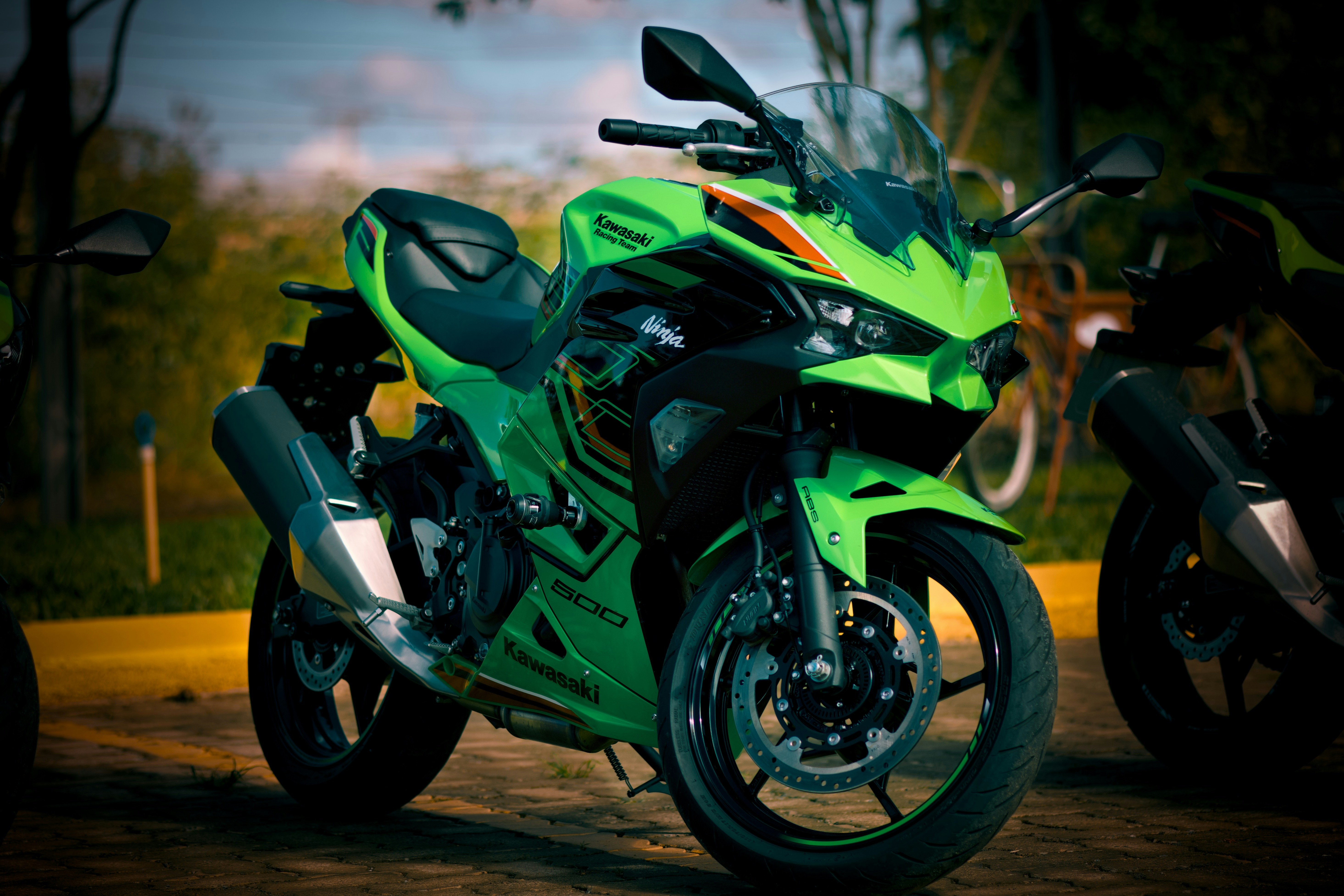 A green kawasaki motorcycle is pictured.