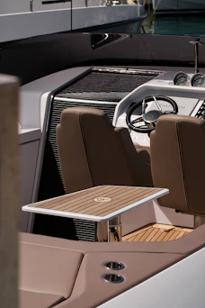 A luxurious boat interior with seats and table