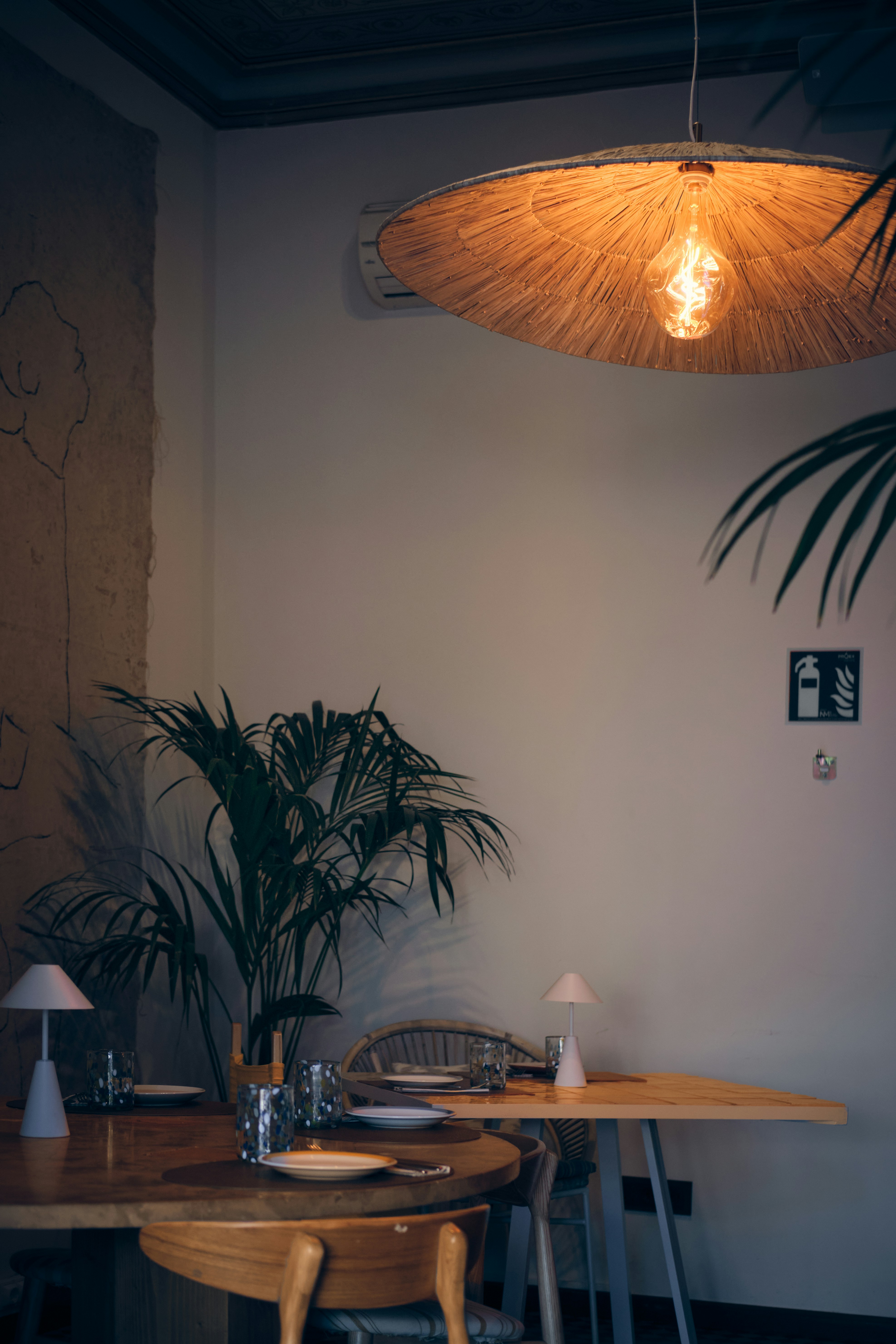 A warm, inviting restaurant interior is shown.