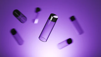 Several purple vials float against a gradient background.