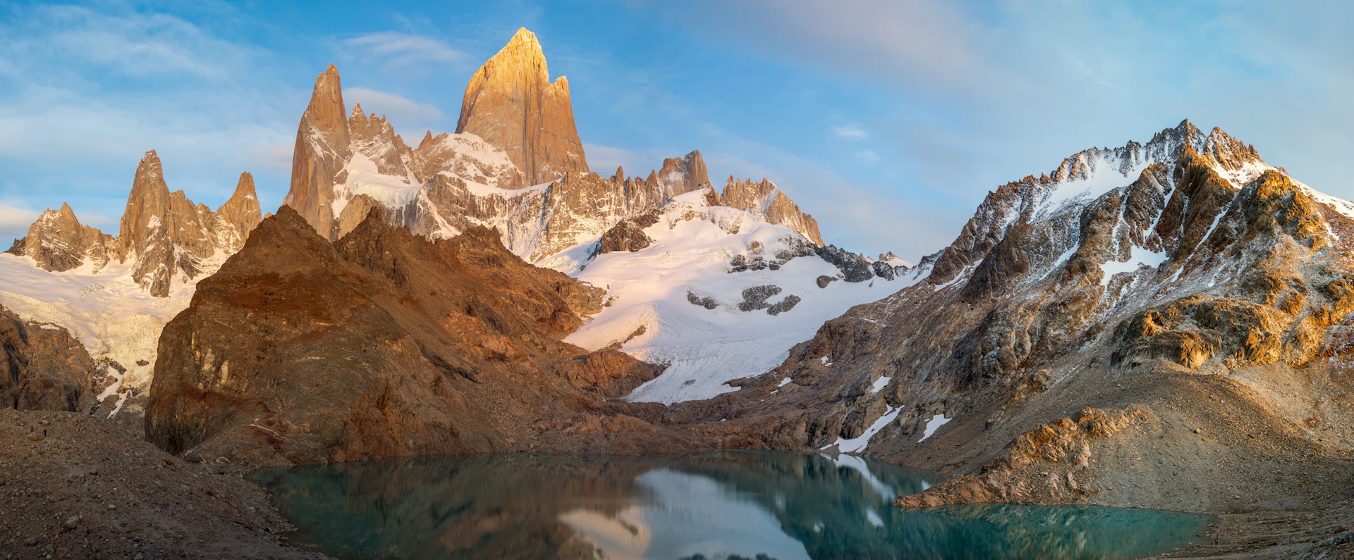 Mountains and lake under a beautiful blue sky.