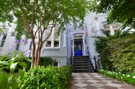 A beautiful house with a blue door.