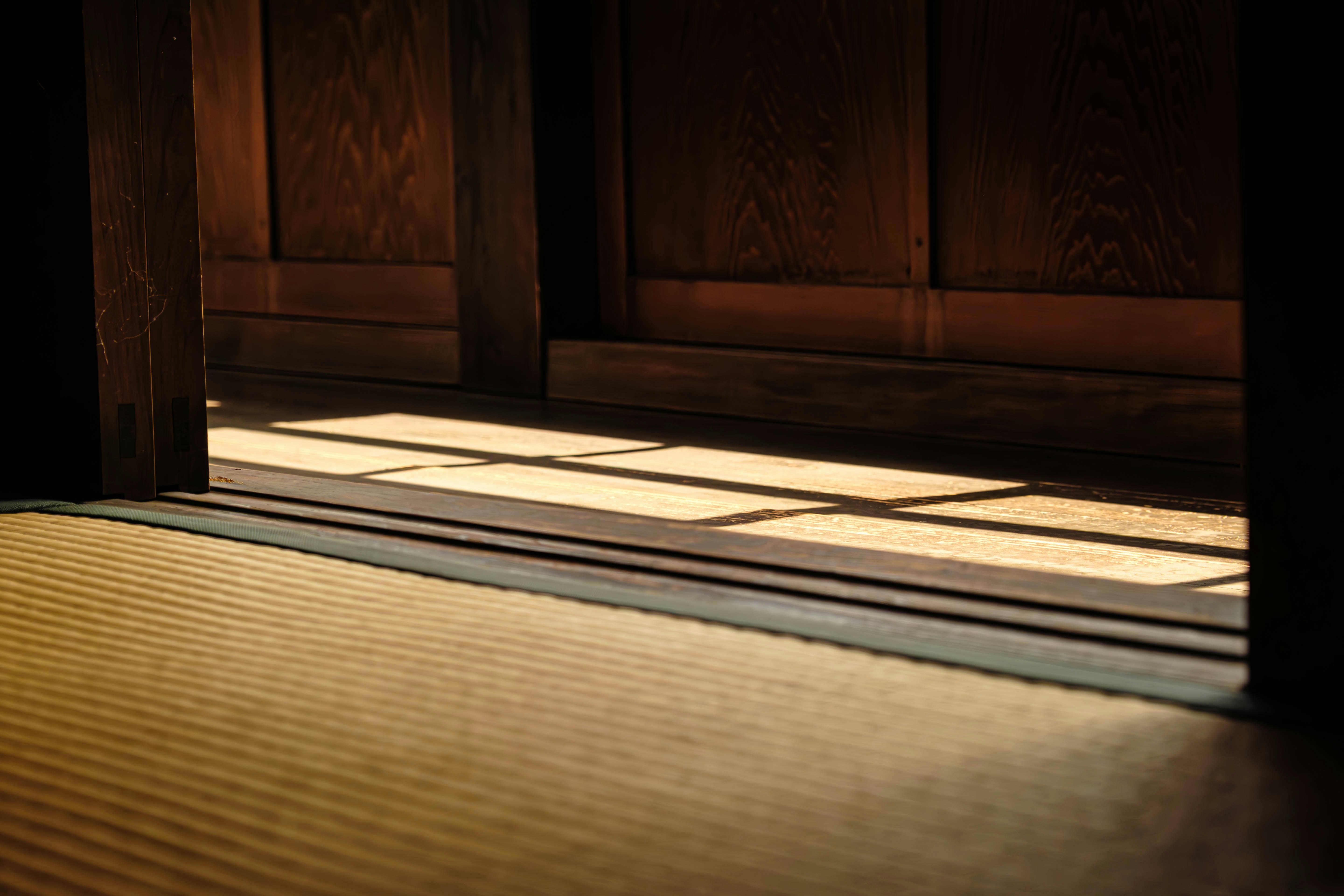 Sunlight streams through a doorway.