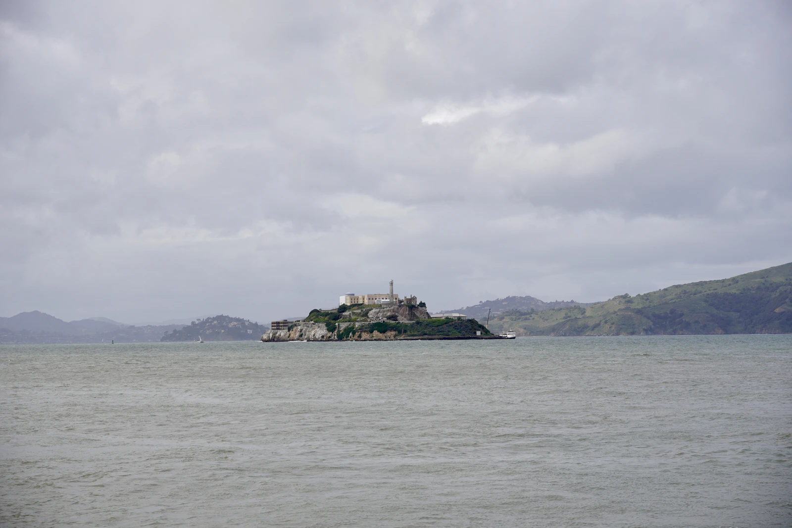 Yacht cruising past Alcatraz and Angel Island on San Francisco Bay
