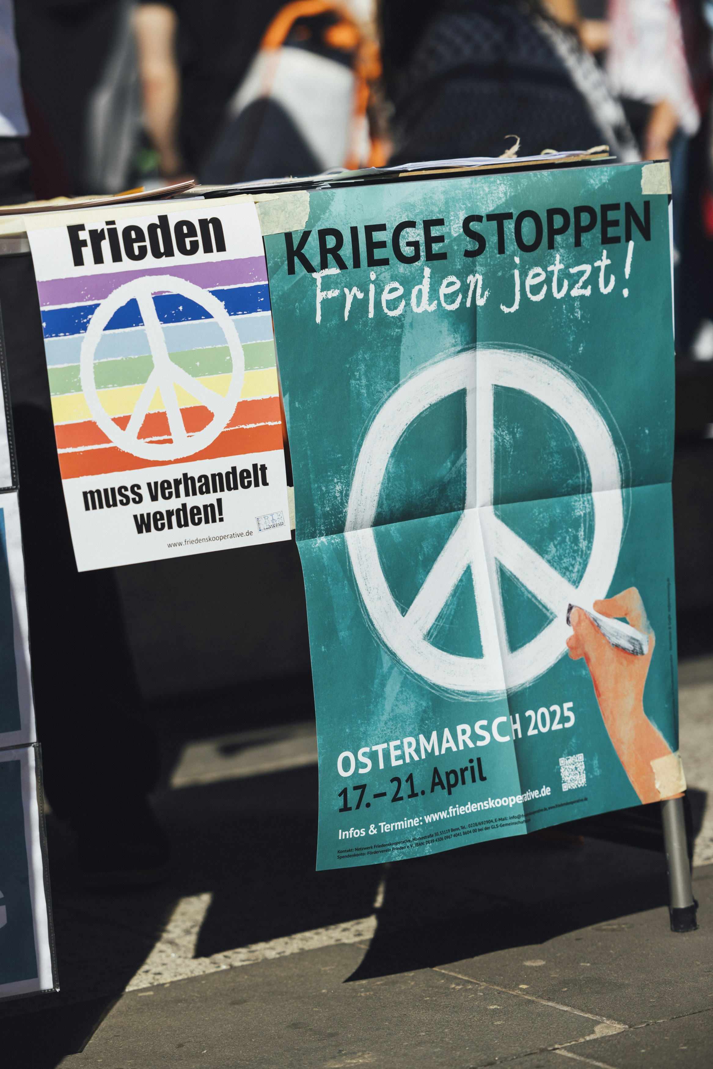 Peace signs and a banner advocate for peace.