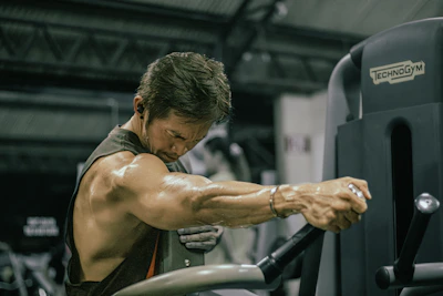 Man is working out at the gym.