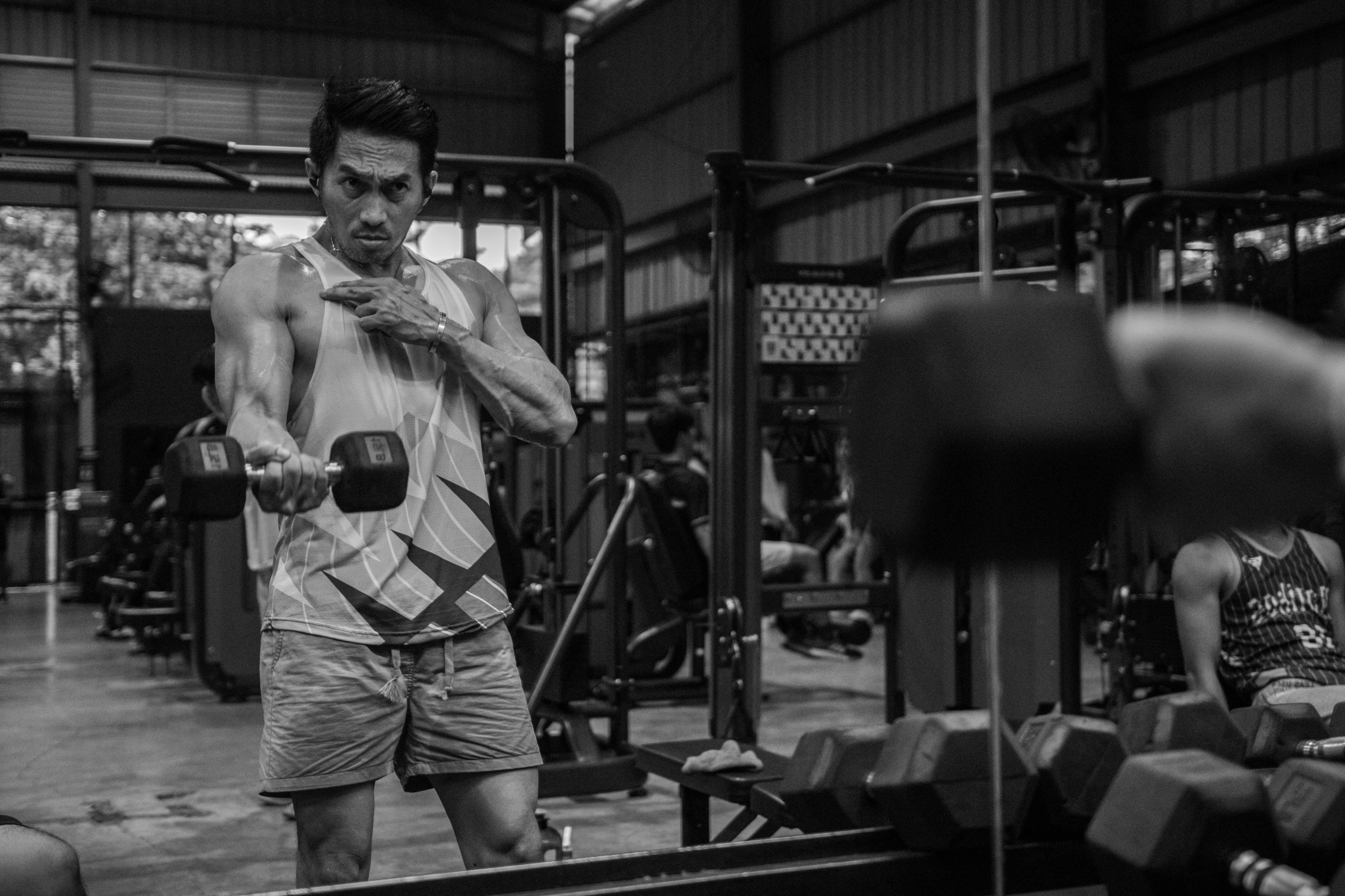 man working out with weights - how to increase male libido