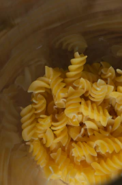 Fusilli pasta fills a jar