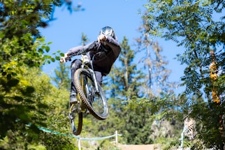 A mountain biker jumps in mid-air.