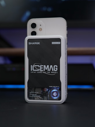 A phone with a cooling device attached.