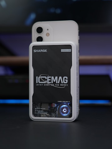 A phone with a cooling device attached.