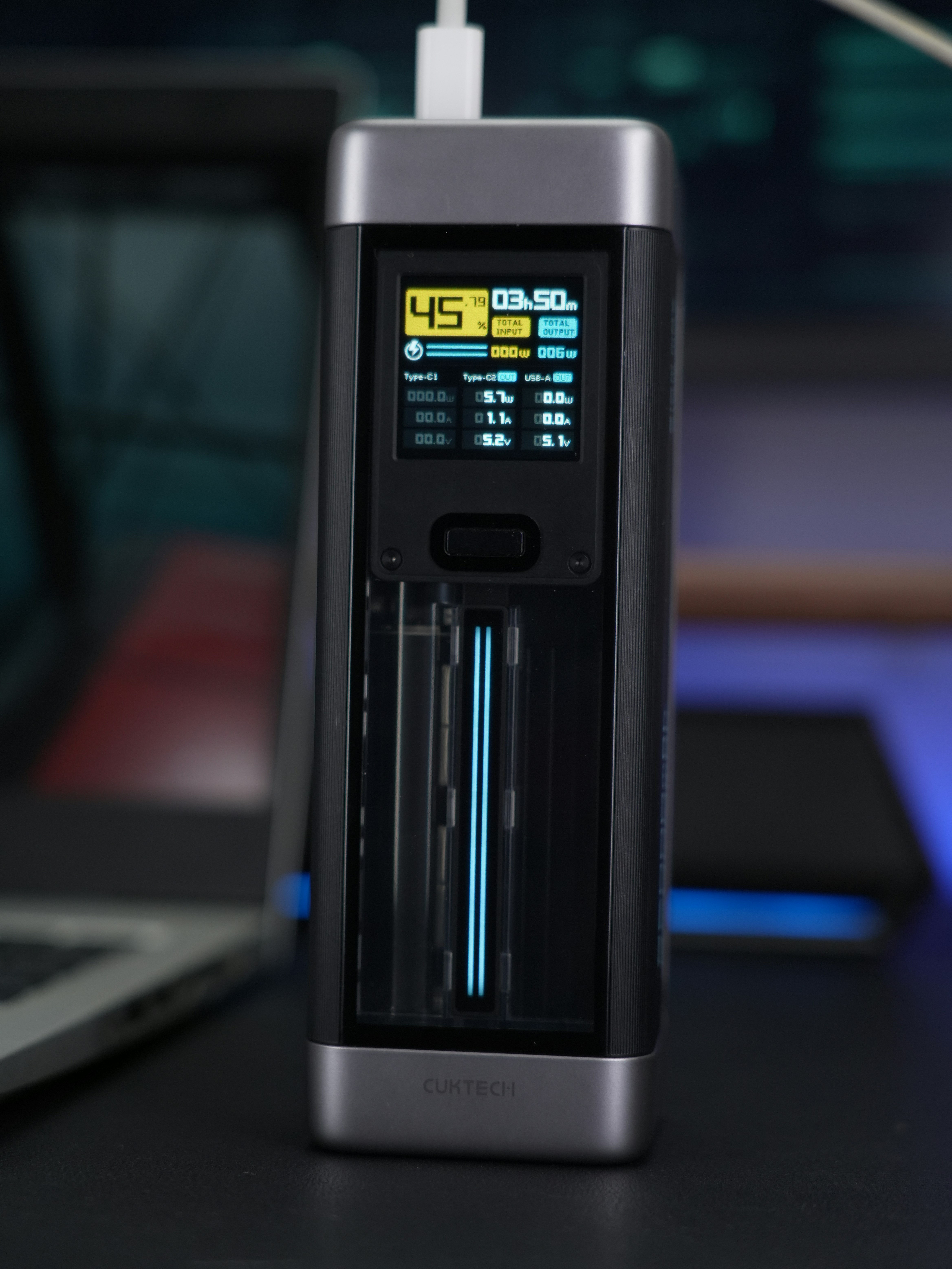 A charging device displaying current information.