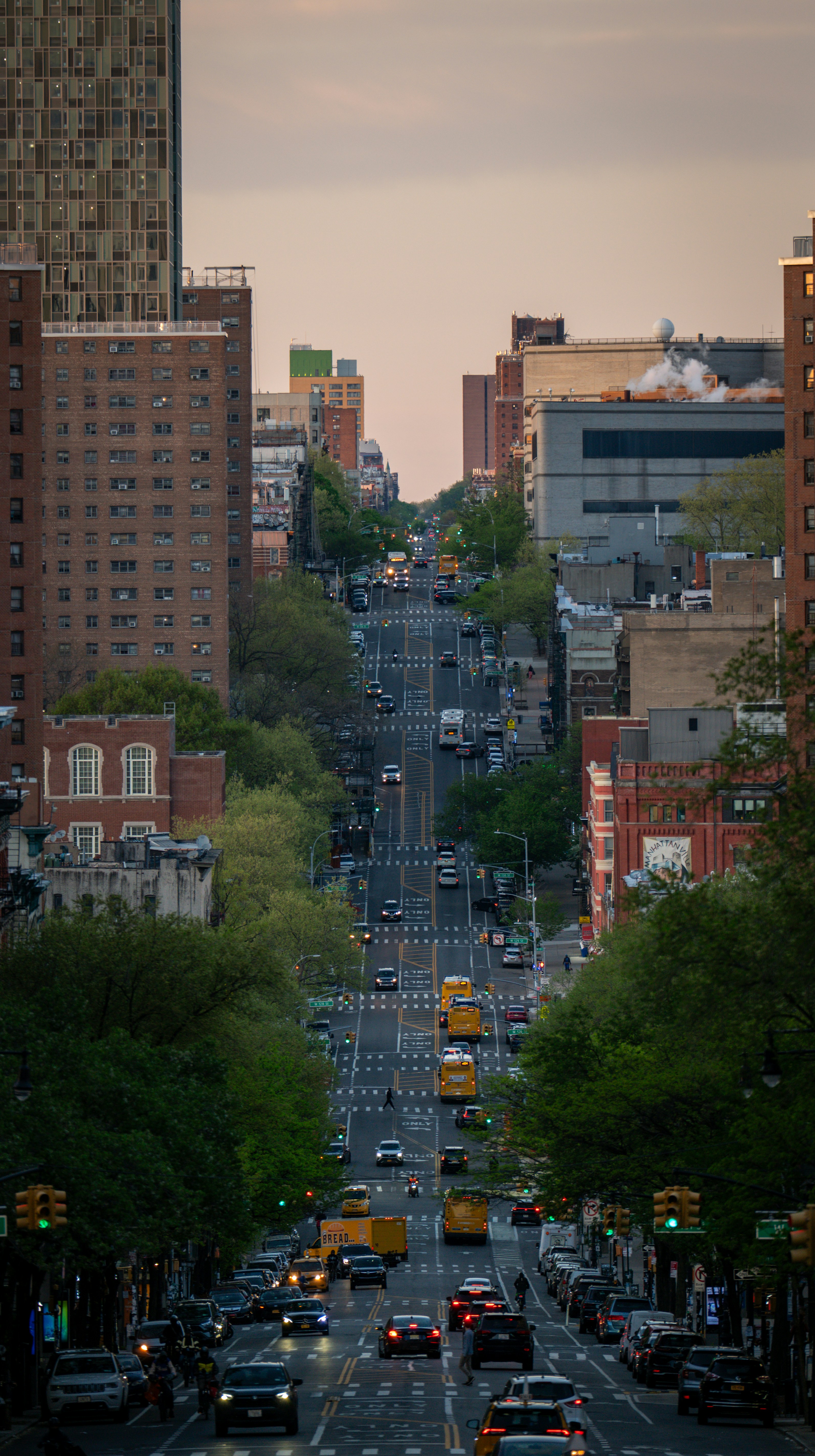 A busy city street with cars during daytime.