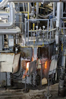 Industrial machinery and equipment inside a factory.