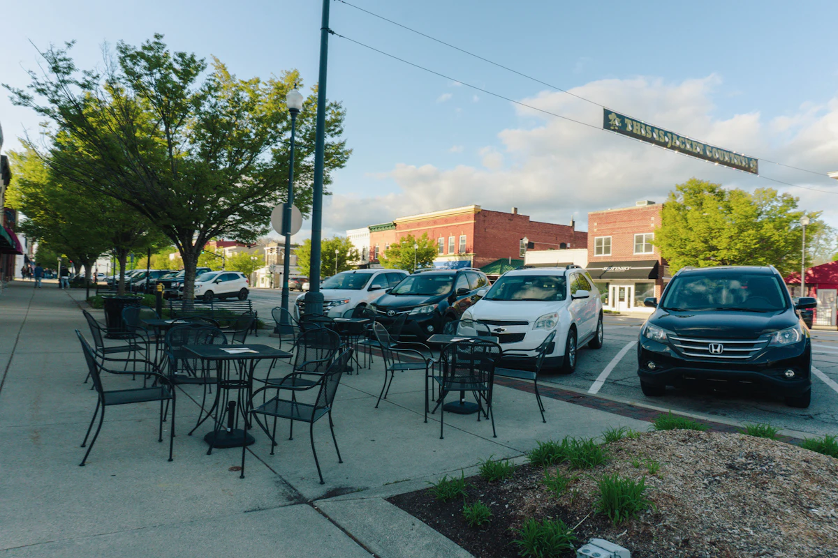 Sidewalk cafe seating and parked cars in downtown Perrysburg, Ohio