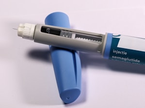 A semaglutide injection pen is shown.