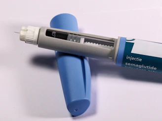A semaglutide injection pen is shown.