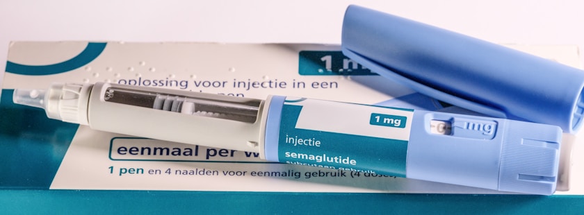 Insulin pen and its packaging are shown.