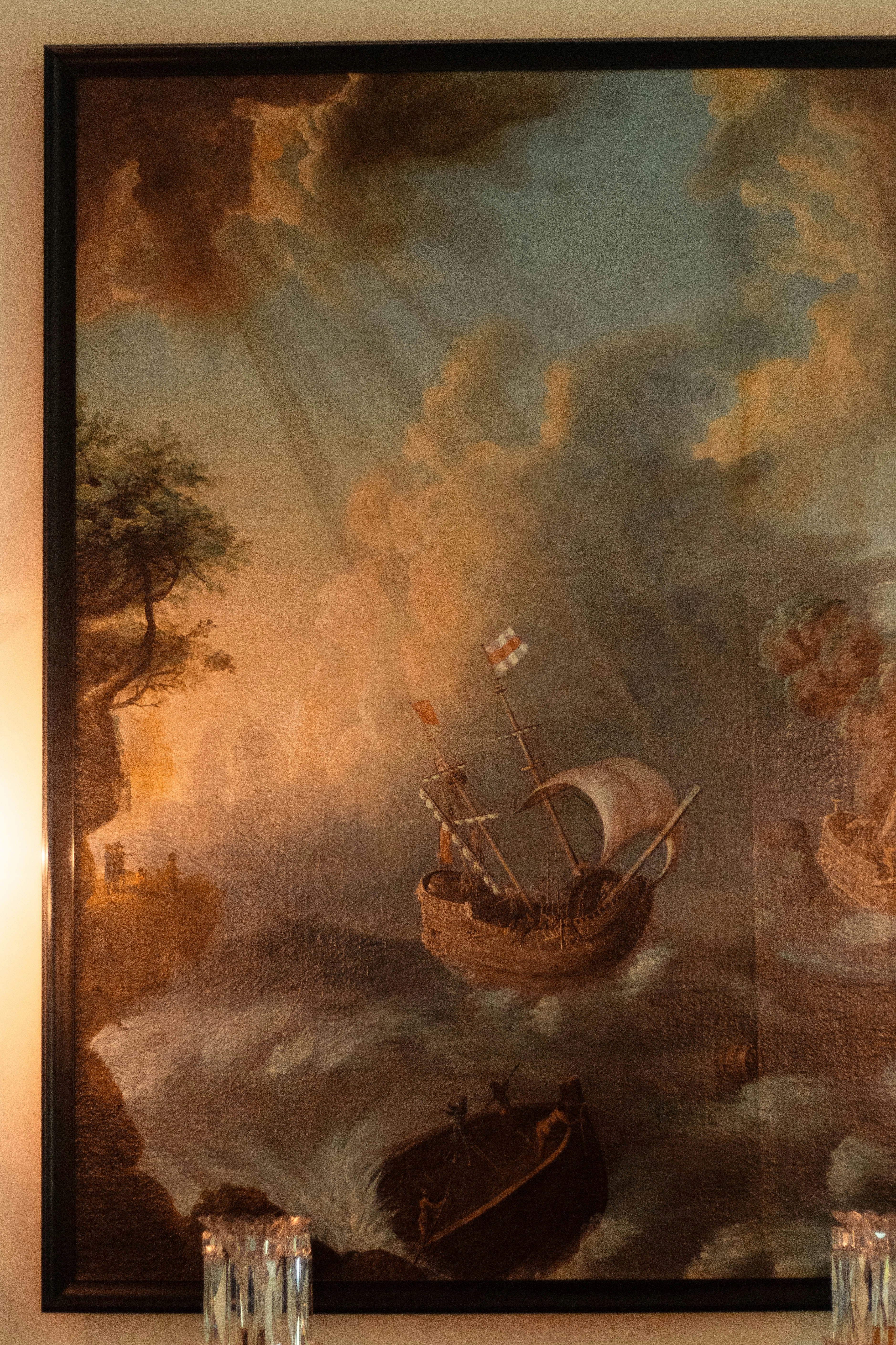 嵐の中を航行する船の絵。