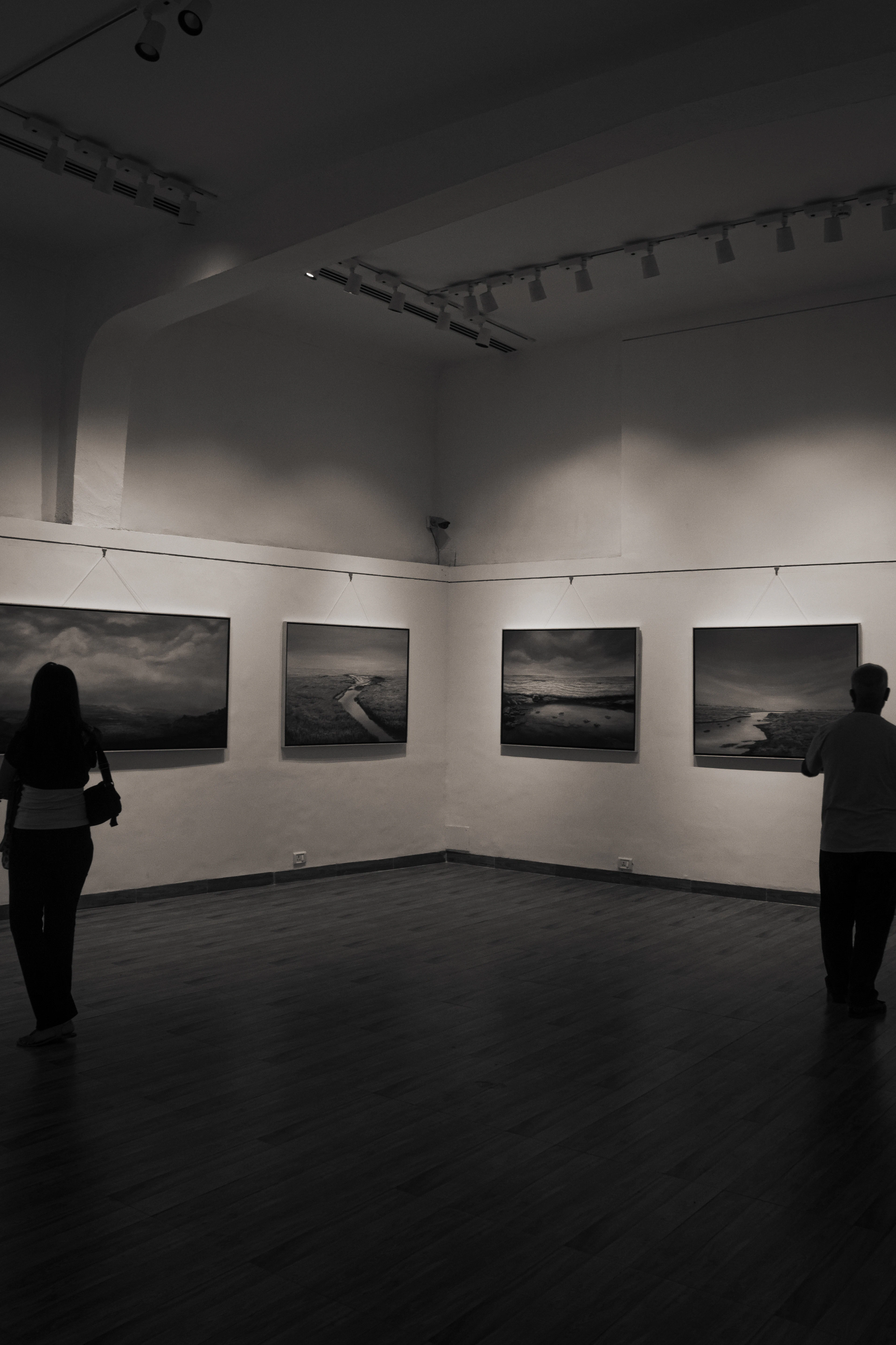 People viewing art in a gallery