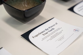 A bowl and paper exhibit "the power of true north."