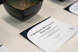 A bowl and paper exhibit "the power of true north."