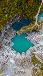 Overhead view of a beautiful turquoise quarry.