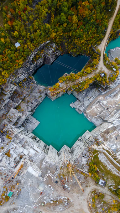 Overhead view of a beautiful turquoise quarry.