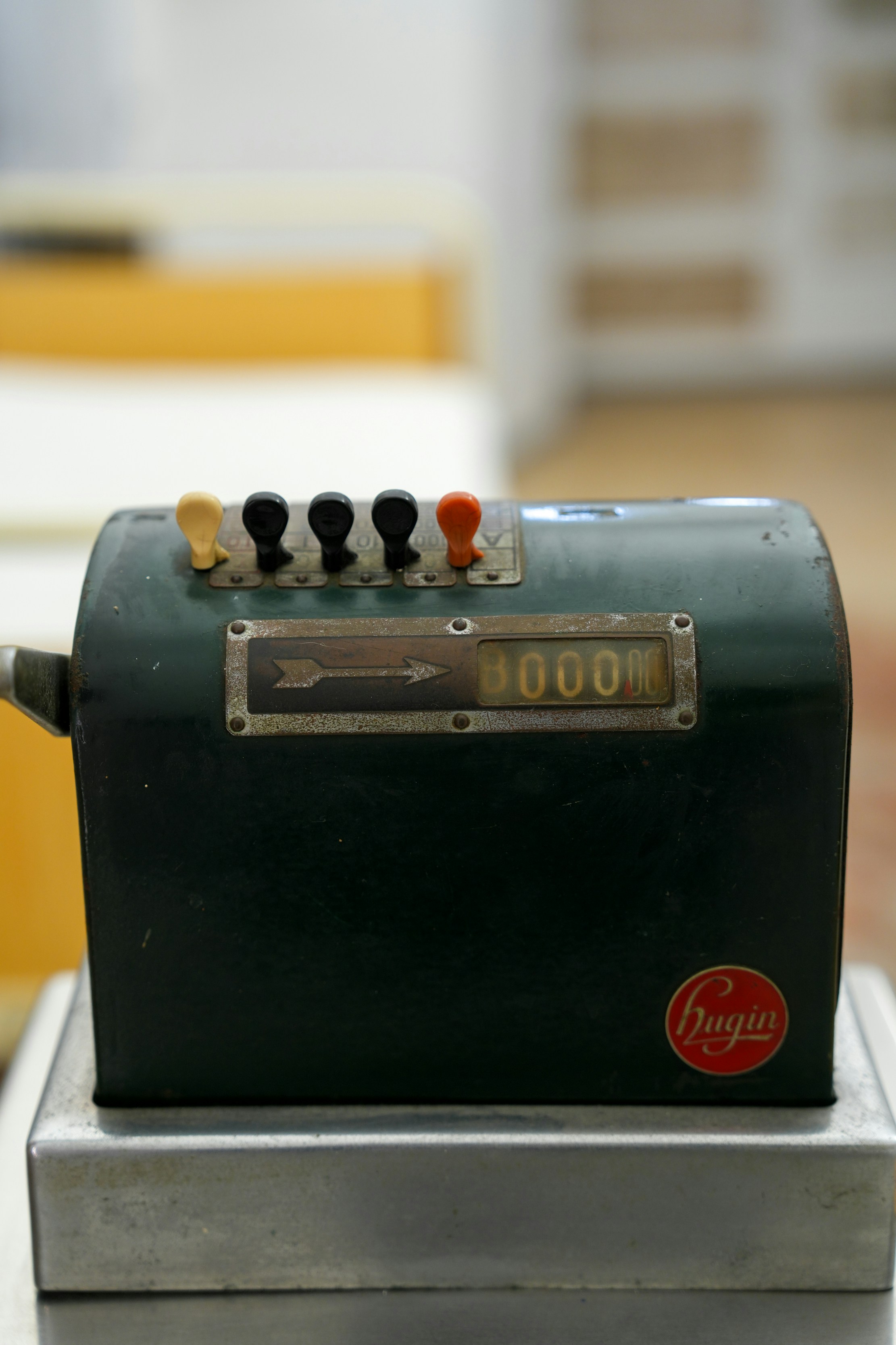 An old mechanical counter displays a 0000 reading.