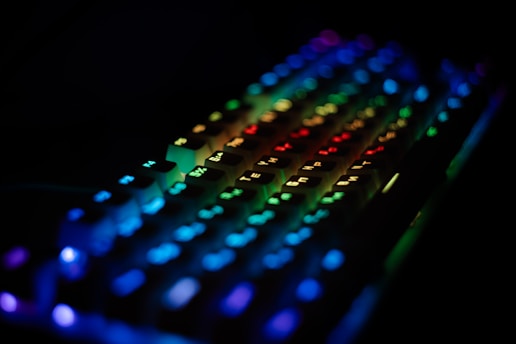 A glowing keyboard lights up the dark.