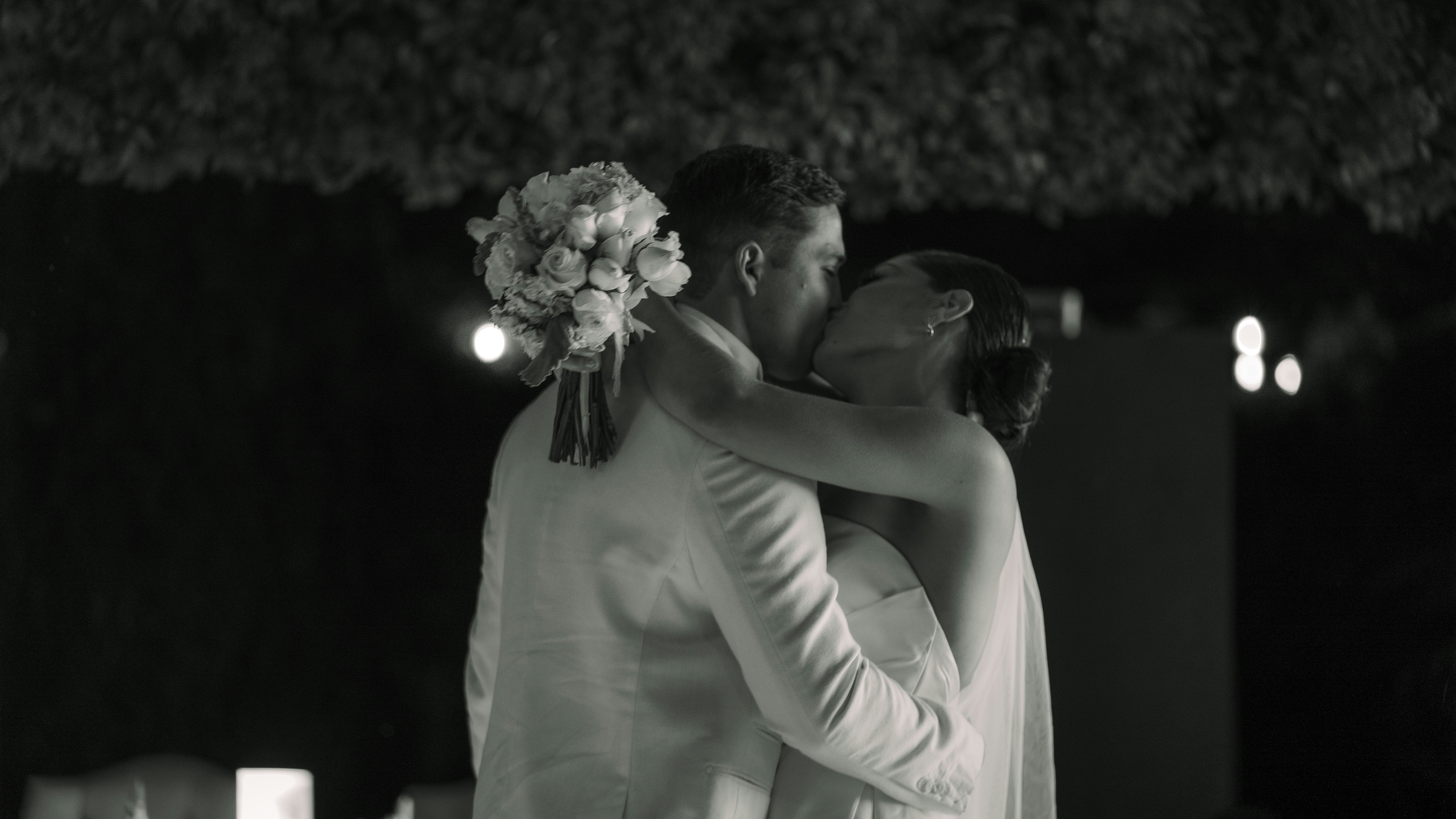 Bride and groom kissing