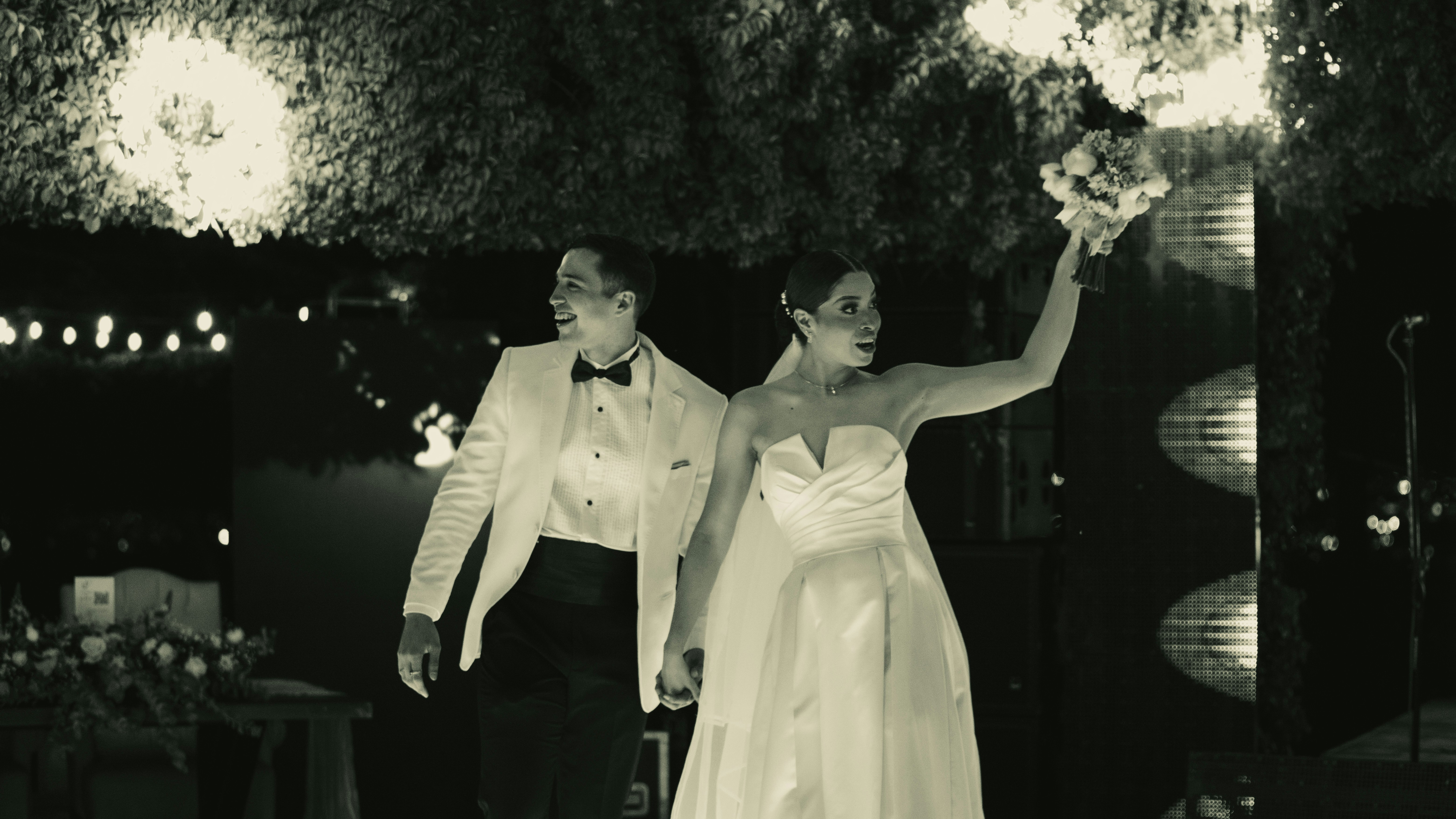 Bride and groom celebrating at wedding reception