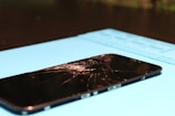 Cracked smartphone screen needs repair.
